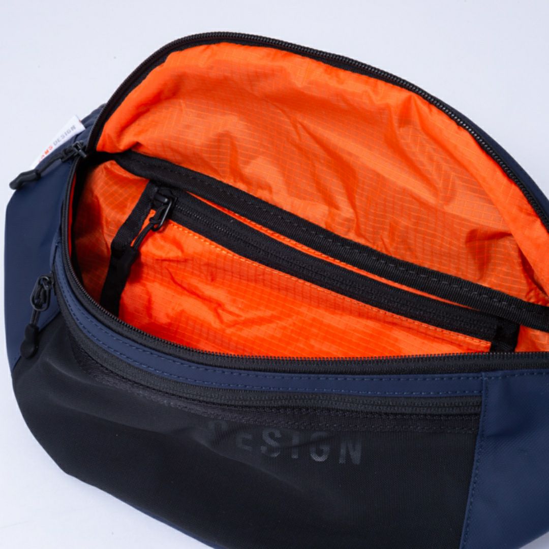 BEAMS DESIGN ELASTIC MESH ボディバッグ【BMMH0BS2】 ネイビー