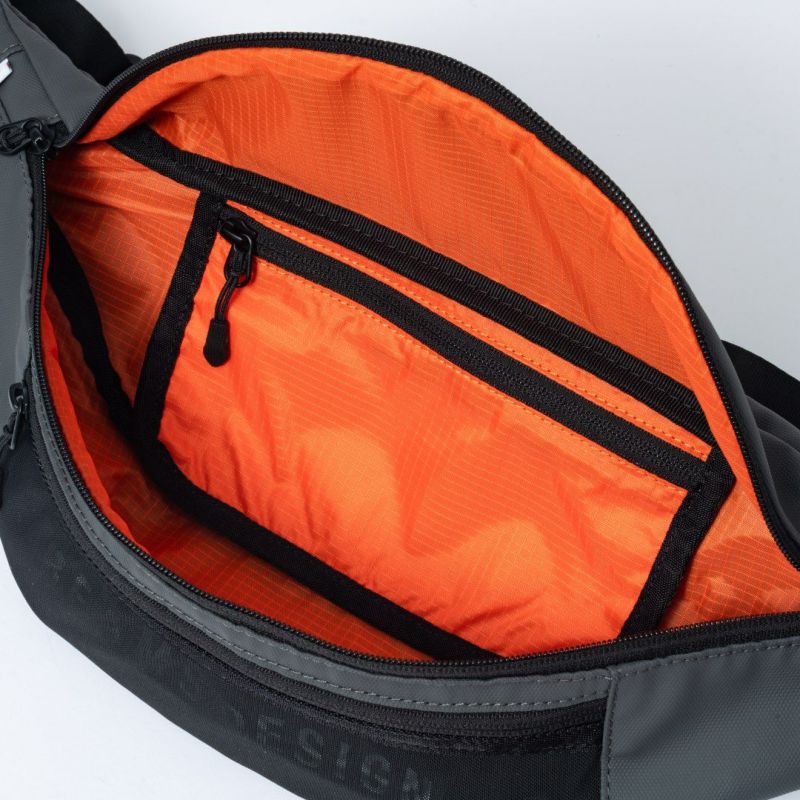 BEAMS DESIGN ELASTIC MESH ボディバッグ 商品｜THE BAGMANIA