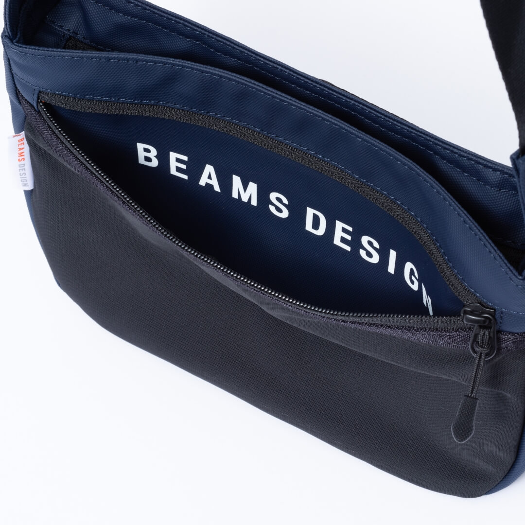 BEAMS DESIGN ELASTIC MESH ショルダーバッグ【BMMH0BS5】 ネイビー