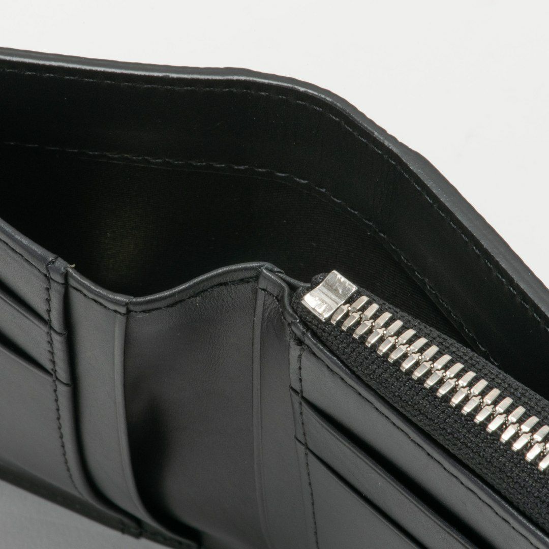 NOMADOI シュリンク L字ファスナー折り財布 ブラック