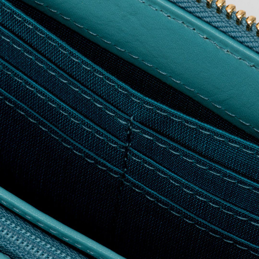 U by ungaro ミレーユ ラウンドファスナー長財布 ターコイズブルー 